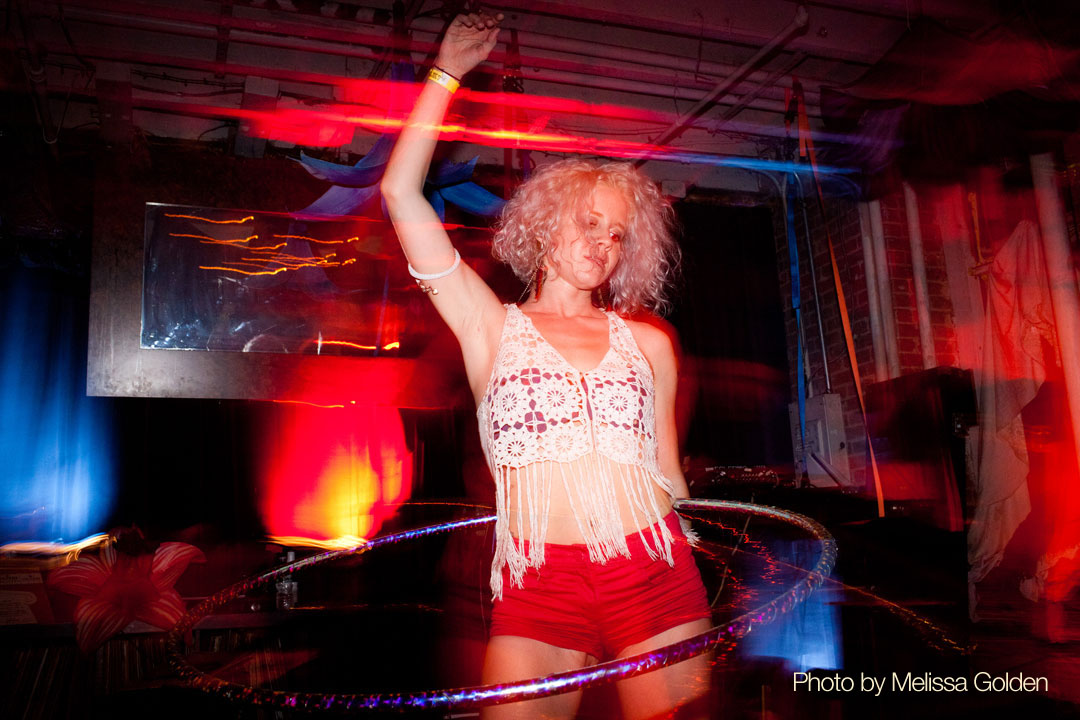 Hooping at a Stranded from Burning Man party.  Photo by Melissa Golden.